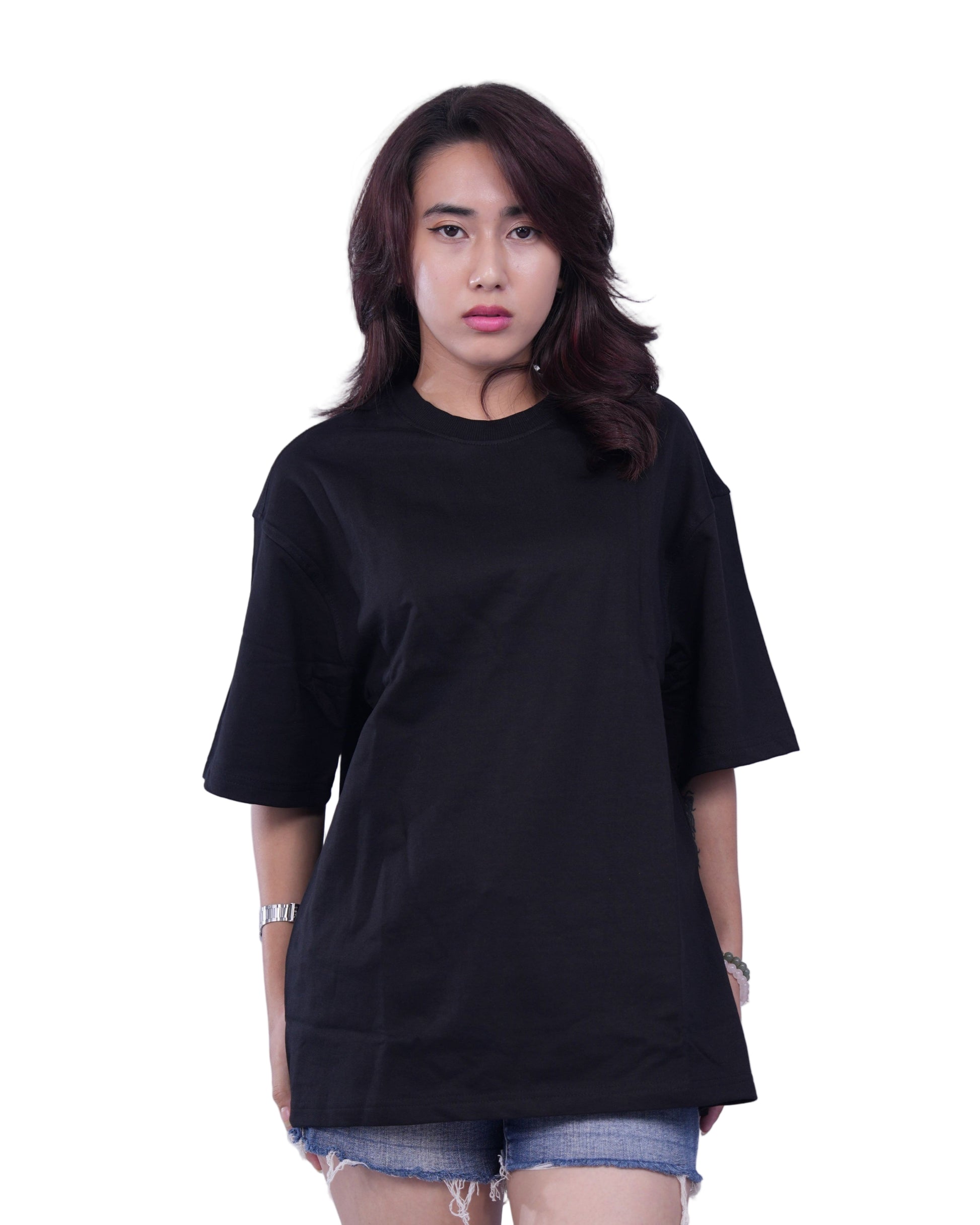 Woman wearing a black oversize t-shirt