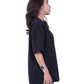 Woman wearing a black oversize t-shirt