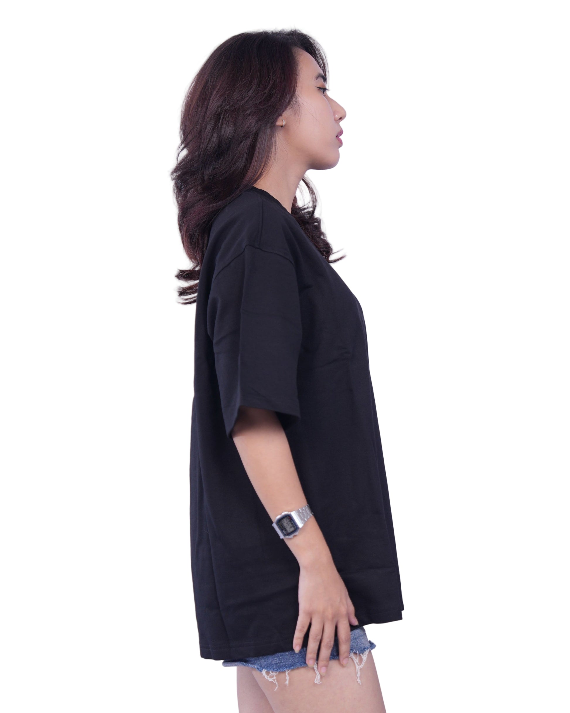 Woman wearing a black oversize t-shirt