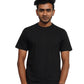 Person wearing a black shirt and jeans on a background