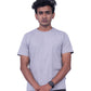 Person wearing a gray t-shirt and  pants on a background