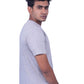 Person wearing a  gray T-shirt on a  background