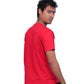 Person wearing a red shirt and black pants on a white background