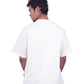 Man wearing a cream oversize t-shirt 