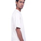 Person wearing a cream oversize t-shirt 