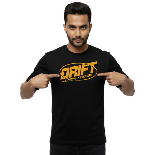 Front view of “Drift Culture — Spark Plug Streetwear Tee” on male model pointing at bold chest logo, unisex regular fit streetwear T-shirt by Crafted Community black 