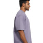 Person wearing a lavender oversize t-shirt
